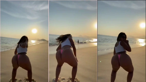 Ani Rocha fazendo um show quente na praia, rebolando gostoso