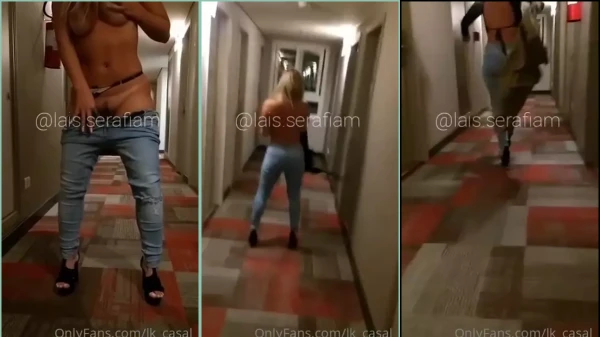 Bucetuda Lais se exibindo no corredor do hotel enquanto tira a roupa