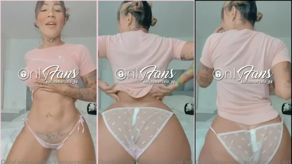 Karina Marcela de top e calcinha branquinha se divertindo ao som da música