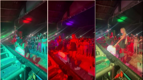 Karlyane Menezes exibindo os peitos pro gringo na festa