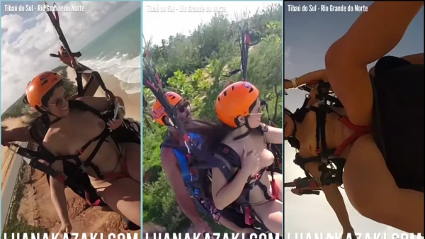 Luana Kazaki, toda pelada, registrando seu rolê de parapente