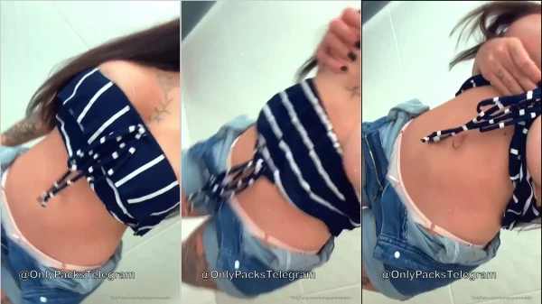Nayara Macedo de shorts jeans exibindo os peitões