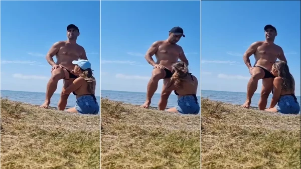 Nino e Aline se pegando na praia pública