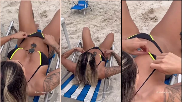 Tati Eliasquevici gravou um vídeo se bronzeando na praia