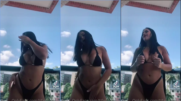 Tifany Rocha, uma morena de curvas irresistíveis, se soltando e fazendo strip tease na varanda