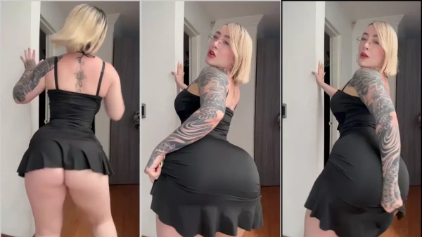 Verônica Obando com um vestido preto, toda charmosa e irresistível