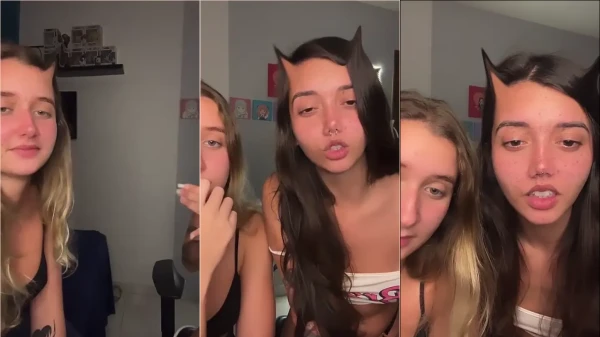 Bia Trois, uma morena de peitão, cheia de charme e de óculos, se mostrando toda linda no vídeo